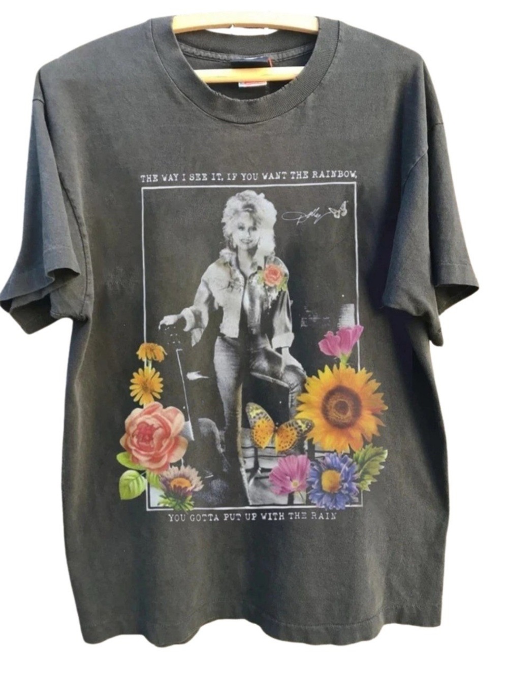 Dolly Parton Charcoal T-Shirt if you want the rainbow put up with the rain